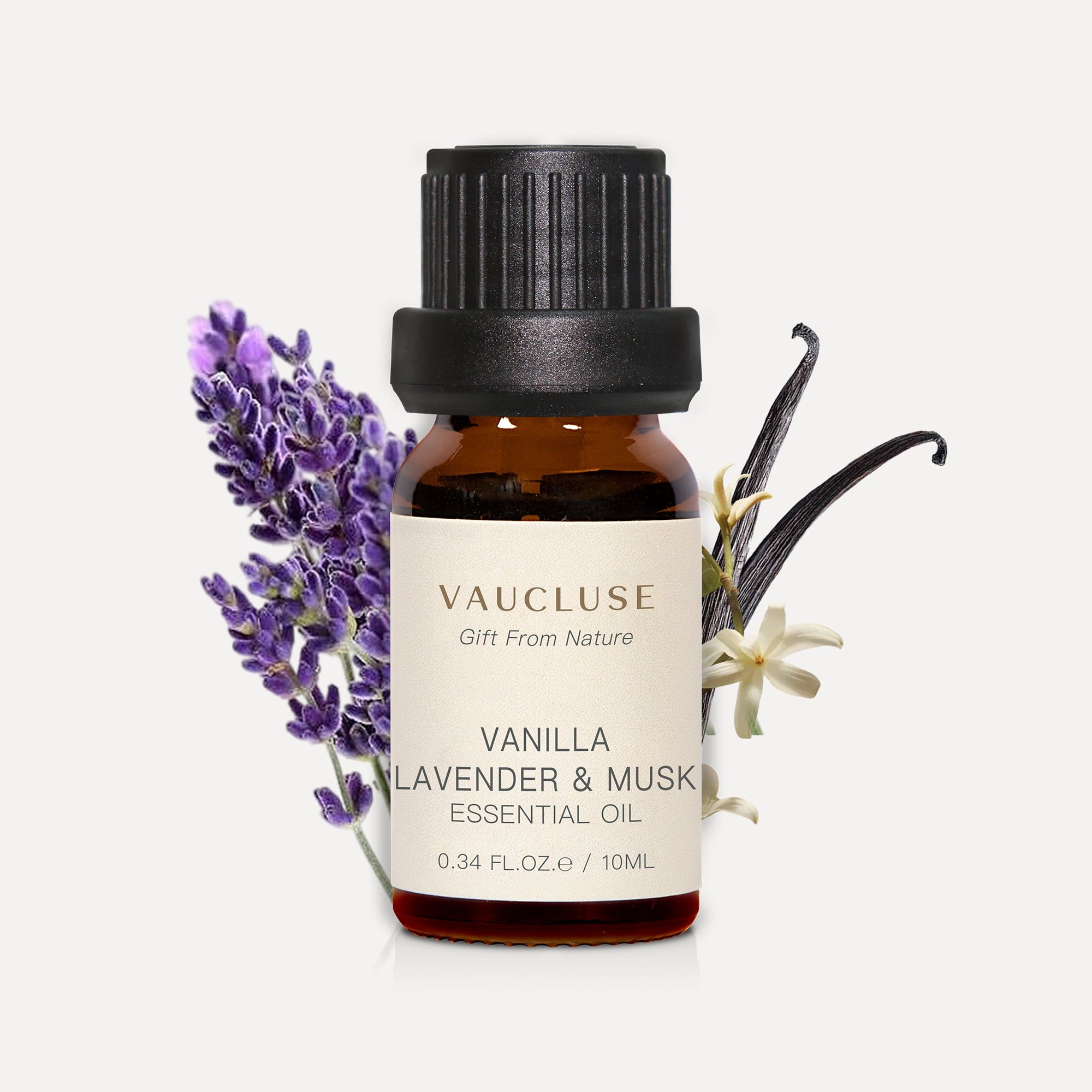 Vaucluse 10ml Vanilla Lavender and Musk essential oil amber glass bottle styled with lavender sprigs and vanilla beans.