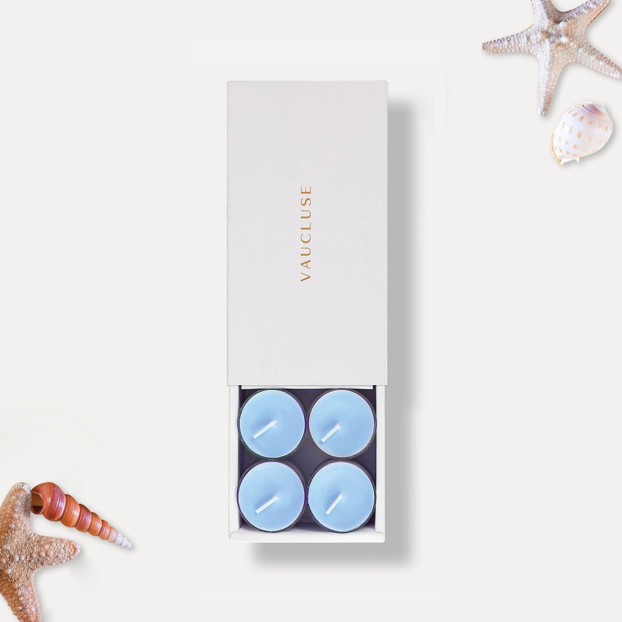 Vaucluse Zephyr scented tealight candles in minimalist luxury packaging.